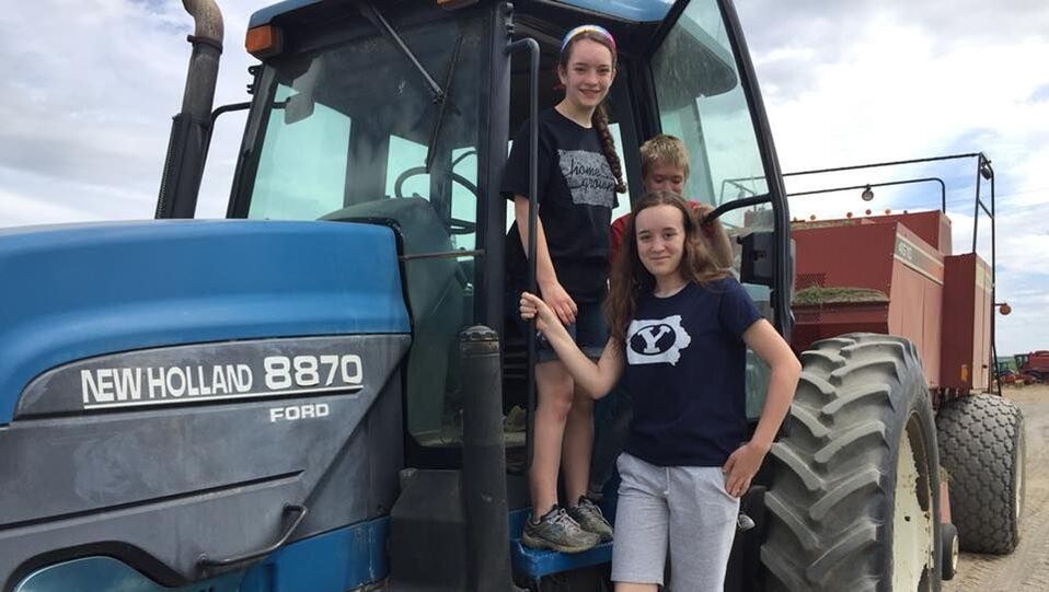 Picture of teenagers on a tractor