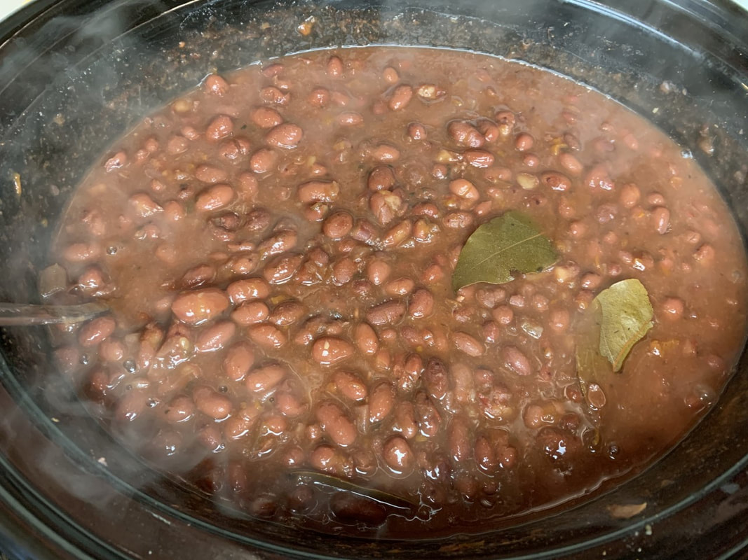 Picture of crock-pot full of cooked red beans